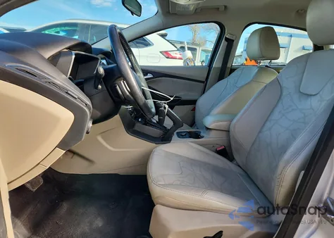 2013 Ford Focus Bev z USA, uszkodzony, nr VIN 1FADP3R40DL245511